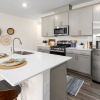Kitchen with chef's island and stainless steel appliances