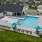 Community Resort Style Zero-entry Pool with Sunshelf